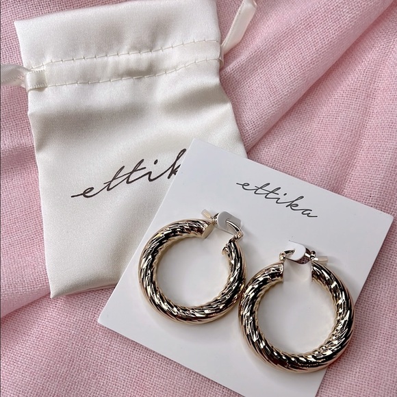 ettika Jewelry - Ettika croissant swirled gold thick hoop earrings brand new